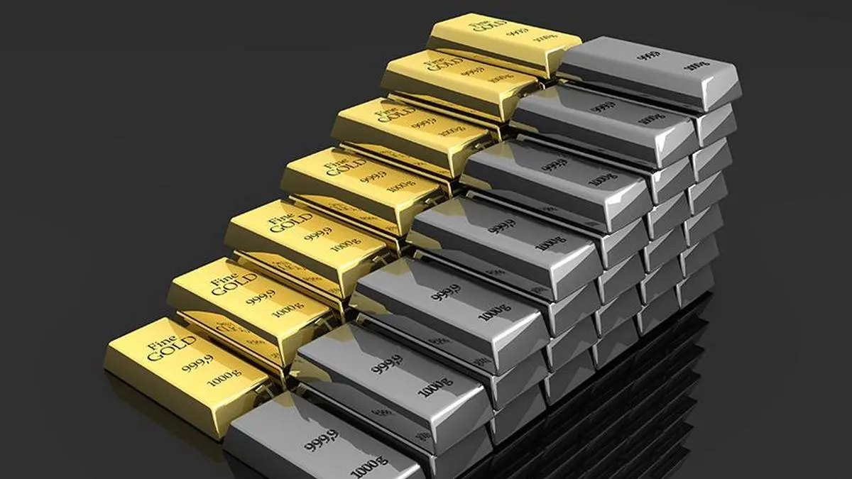 Gold, silver futures drop as Fed minutes, strong dollar weigh on safe-haven asset