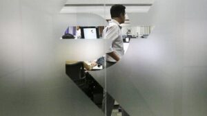 Rupee trades in narrow range against U.S. dollar in early trade