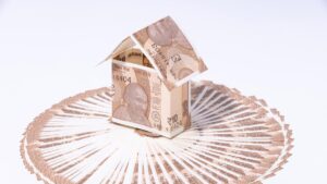 Rupee slips 15 paise to close near 90 against the US dollar in weak trade