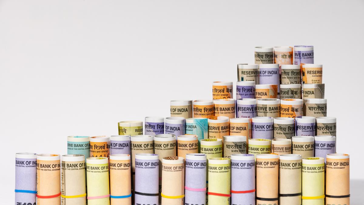 Rupee slips past 90 level and settles 22 paise lower at 90 point 20 vs US dollar