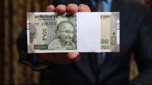 Rupee gains 18 paise to trade at 90 point 12 against the US dollar in early trade