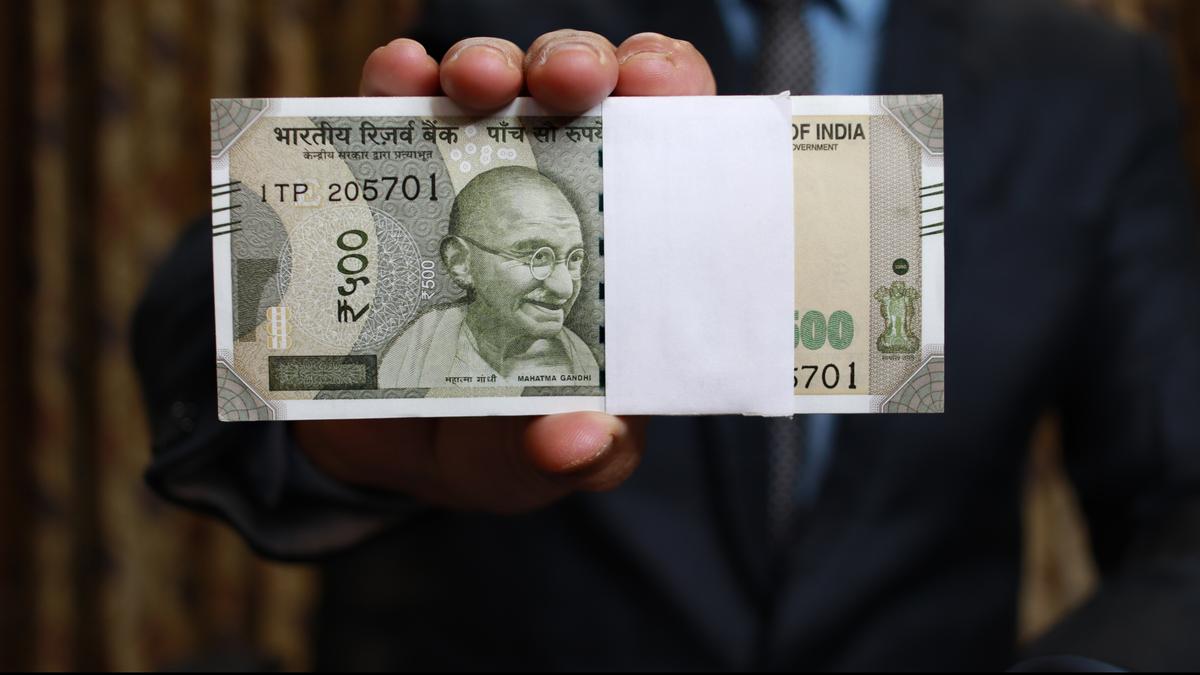 Rupee gains 18 paise to trade at 90 point 12 against the US dollar in early trade
