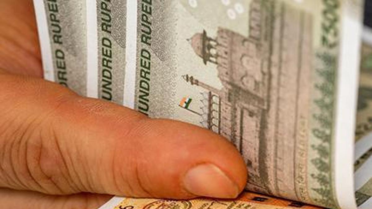 Rupee gains 31 paise to end at eighty nine point eight seven against dollar